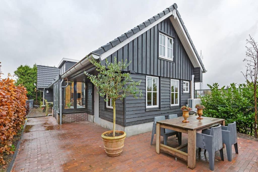 Uniek Houten Huis Nabij Bos En Plassen Hollandsche Rading Eksteriør bilde